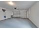 Spacious garage with ample room for vehicles and storage at 10412 Tara Dr, Riverview, FL 33578