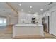 Modern kitchen with an island, stainless appliances, and lots of cabinets at 10412 Tara Dr, Riverview, FL 33578