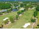 Scenic aerial view of the lush green golf course and surrounding community at 13618 Greenfield Dr # 105, Tampa, FL 33618