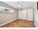 Bedroom with closet, ceiling fan, and hardwood floors at 13618 Greenfield Dr # 105, Tampa, FL 33618