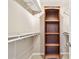 Walk-in closet featuring shelving and closet rods for organized storage at 13618 Greenfield Dr # 105, Tampa, FL 33618
