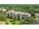 Condo building featuring multiple balconies at 13618 Greenfield Dr # 105, Tampa, FL 33618
