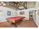 Inviting game room with a pool table, decorative lighting, and ample space for recreational activities at 13618 Greenfield Dr # 105, Tampa, FL 33618