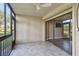 Spacious tiled lanai leads to the interior through a large sliding glass door at 13618 Greenfield Dr # 105, Tampa, FL 33618