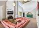 Spacious living room with a fireplace, high ceilings, and ample seating for relaxing and entertaining at 13618 Greenfield Dr # 105, Tampa, FL 33618