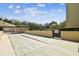 Outdoor shuffleboard courts provide recreational opportunities for residents with a nearby pool at 13618 Greenfield Dr # 105, Tampa, FL 33618