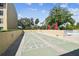Shuffleboard court located next to the pool and other outdoor recreational areas at 13618 Greenfield Dr # 105, Tampa, FL 33618