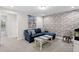 Cozy basement featuring comfortable seating and stylish decor at 14110 Damselfly Dr, Tampa, FL 33625