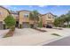 Attractive townhomes with well-maintained landscaping, private garages, and inviting curb appeal at 14110 Damselfly Dr, Tampa, FL 33625