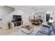 Cozy living room with a view of the kitchen and dining area at 14110 Damselfly Dr, Tampa, FL 33625