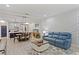 Bright living room featuring stylish furniture, a decorative accent wall, and an open layout at 14110 Damselfly Dr, Tampa, FL 33625