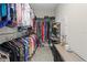 Spacious walk-in closet with ample storage and organization at 14110 Damselfly Dr, Tampa, FL 33625