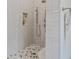 Modern shower with gray tile and a rainfall shower head at 16712 Courtyard Loop, Land O Lakes, FL 34638