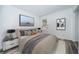 Inviting bedroom with calming decor, a cozy bed, neutral tones, and stylish wall art creating a relaxing retreat at 1799 N Highland Ave # 106, Clearwater, FL 33755