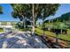 Exterior of common area with picnic tables, grills and well-manicured lawn at 1799 N Highland Ave # 106, Clearwater, FL 33755