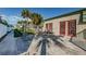 Exterior of the community gym building with double doors and a wreath on the door at 1799 N Highland Ave # 106, Clearwater, FL 33755