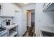 Bright kitchen with white cabinets and modern hardware, plus newer appliances at 1799 N Highland Ave # 106, Clearwater, FL 33755