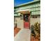 Exterior shot of laundry room facility, with clear signage and hours of operation at 1799 N Highland Ave # 106, Clearwater, FL 33755
