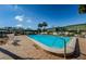 Great community pool area with mature landscaping and plenty of seating at 1799 N Highland Ave # 106, Clearwater, FL 33755