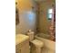 Functional bathroom features tile walls, a shower-tub combo, and a vanity sink at 1806 Marvy Ave, Tampa, FL 33612