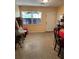 Cozy room features neutral paint, ample natural light, and a functional doorway to the exterior at 1806 Marvy Ave, Tampa, FL 33612