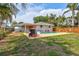 Expansive backyard showcasing a sparkling pool, lounging area, perfect for relaxing or entertaining guests at 2620 49Th N Ave, St Petersburg, FL 33714