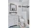 Bathroom featuring a vessel sink, modern fixtures, and a tiled glass-enclosed shower at 2620 49Th N Ave, St Petersburg, FL 33714