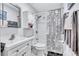 Clean bathroom featuring a shower with white tile surround and modern shower curtain at 2620 49Th N Ave, St Petersburg, FL 33714