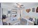 Bright office space with a ceiling fan, sliding mirror door closet and additional seating at 2620 49Th N Ave, St Petersburg, FL 33714