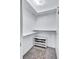 Walk-in closet with shelving and shoe rack for ample storage and organization at 2620 49Th N Ave, St Petersburg, FL 33714