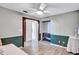 Open dining area with neutral paint scheme, wood floors, and ceiling fan at 2620 49Th N Ave, St Petersburg, FL 33714