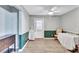 Open dining area with neutral paint scheme, wood floors, and ceiling fan at 2620 49Th N Ave, St Petersburg, FL 33714