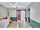 Open dining area with neutral paint scheme, wood floors, and ceiling fan at 2620 49Th N Ave, St Petersburg, FL 33714