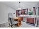 Cozy kitchen with wood cabinets, stainless steel appliances, and center island at 2620 49Th N Ave, St Petersburg, FL 33714