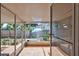 Enclosed lanai providing additional living space with access to the backyard and pool at 2620 49Th N Ave, St Petersburg, FL 33714
