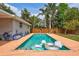 Stunning backyard pool and patio, ideal for entertaining and enjoying the Florida sunshine at 2620 49Th N Ave, St Petersburg, FL 33714