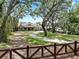 Beautifully landscaped property with a long driveway leading to the house at 2621 Stearns Rd, Valrico, FL 33596