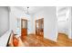 Welcoming foyer with hardwood floors, bench, and decorative front door with glass detailing at 2621 Stearns Rd, Valrico, FL 33596