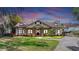 Charming home featuring a landscaped front yard and inviting entrance at 2621 Stearns Rd, Valrico, FL 33596