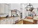 Well-equipped kitchen featuring custom cabinetry, granite countertops, and stainless steel appliances at 2621 Stearns Rd, Valrico, FL 33596