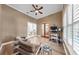 Spacious home office featuring neutral walls, hardwood flooring, and plenty of natural light at 2621 Stearns Rd, Valrico, FL 33596