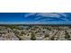 Expansive aerial view showcasing a community with multiple ponds, mature trees, and a network of streets at 3835 Sailmaker Ln # X, Holiday, FL 34691