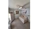 Cozy bedroom featuring a daybed, wicker dresser, and soothing pastel walls, creating a tranquil retreat at 3835 Sailmaker Ln # X, Holiday, FL 34691
