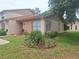 Charming townhouse featuring well-maintained landscaping and inviting curb appeal at 3835 Sailmaker Ln # X, Holiday, FL 34691
