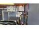 Garage containing HVAC and water heater equipment with space for car parking at 3925 W Eden Roc Cir, Tampa, FL 33634