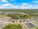 This aerial view shows the house in relation to the neighborhood at 4166 Epic Cv, Land O Lakes, FL 34638