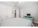 Bright bedroom features a walk-in closet, ensuite bath and a large window at 4166 Epic Cv, Land O Lakes, FL 34638