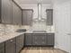 Well-appointed kitchen features granite countertops, stainless steel appliances, and modern cabinetry at 4166 Epic Cv, Land O Lakes, FL 34638