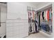 Organized walk-in closet featuring custom shelves, drawers, and ample hanging space at 4166 Epic Cv, Land O Lakes, FL 34638