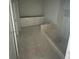 Bathroom area with cabinets, shower, and fixtures awaiting finishing touches at 479 31St N Way, St Petersburg, FL 33713